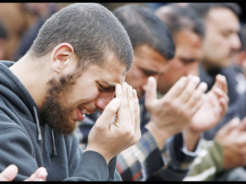 Muslim worshippers take part in Friday prayers in Jerusalem